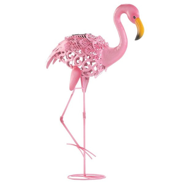 A Summerfield Terrace Solar Lighted Flamingo Yard Art - Leaning standing on a white background.