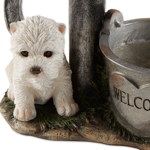 A Summerfield Terrace Terrier Puppy with Birds Solar Garden Light with Flower Pot and bird sitting on a watering can.