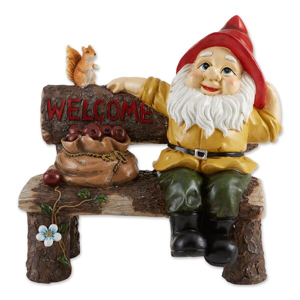 A Summerfield Terrace Garden Gnome and Squirrel on Welcome Bench sitting on a log with a welcome sign.