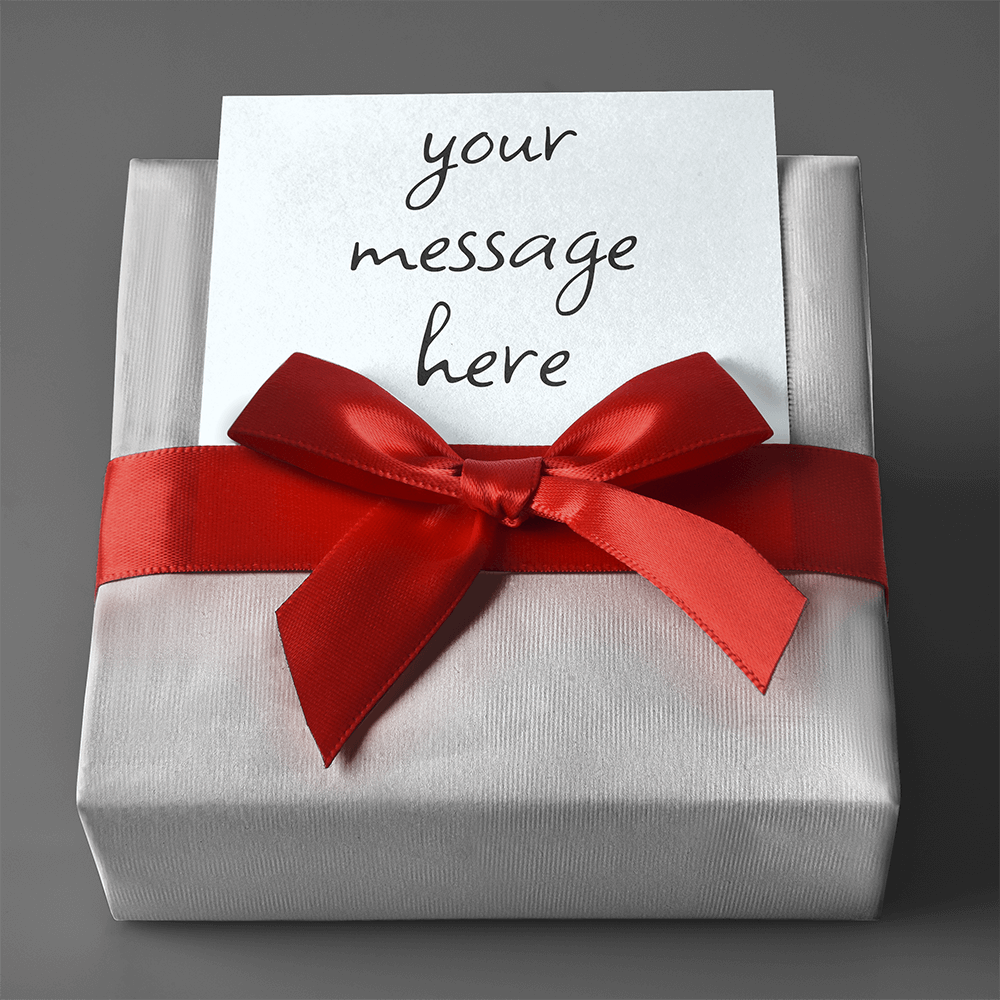 White Gift Wrap with Personalized Message and a red ribbon on a gray background.