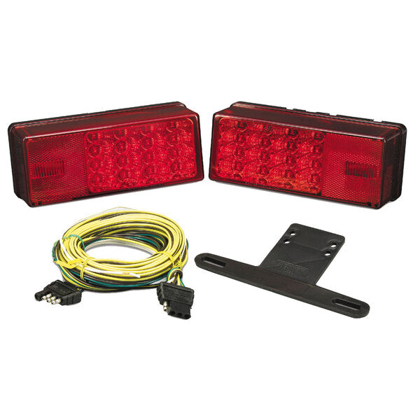 A pair of Wesbar 3" x 8" Waterproof LED Over 80" Trailer Light Kits with wires, ideal for trailer light kit installations.