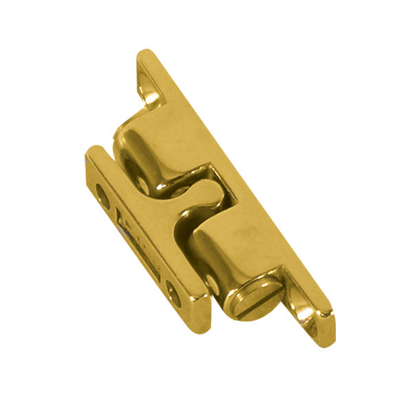 A Whitecap Stud Catch - Brass - 1-3/4" x 5/16" on a white background.