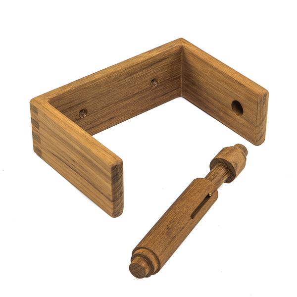 A Whitecap Teak Toilet Tissue Rack with a wooden handle and a wooden screw.