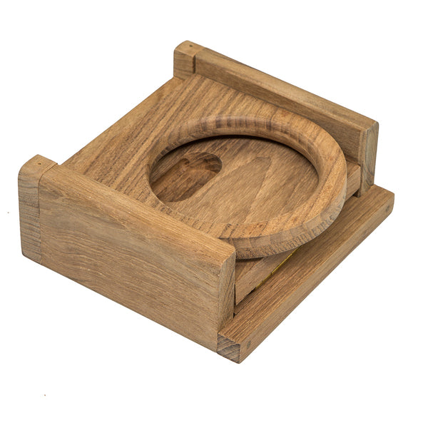 A Whitecap Teak Folding Drink Holder with a gold ring on it.