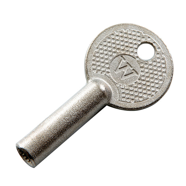 A metal key with the letter w on it, serving as a Whitecap Slam Latch Replacement Key.