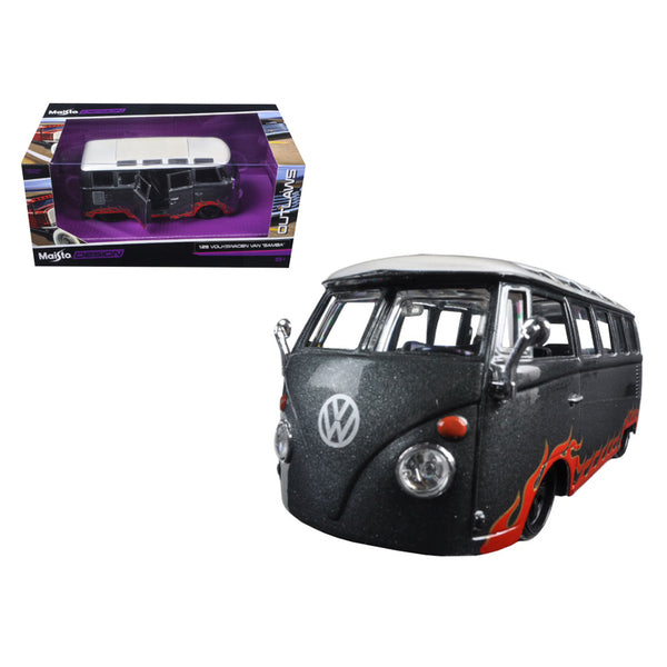 A Volkswagen Van Samba Grey "Outlaws" 1/25 Diecast Model Car by Maisto in front of a box.