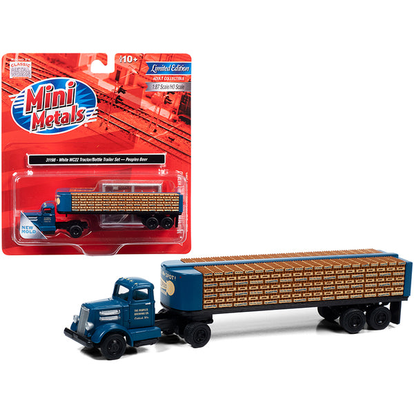A White WC22 Truck Tractor with Bottle Trailer Dark Blue "The Peoples Brewing Co." 1/87 (HO) Scale Model by Classic Metal Works in front of a packaging.