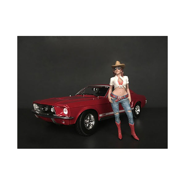 A woman in a cowboy hat is standing next to The Western Style Figurine I for 1/18 Scale Models by American Diorama.