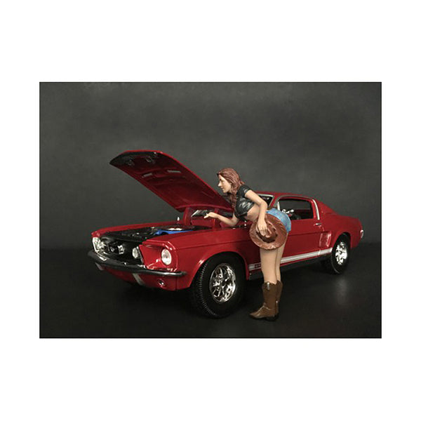 A model of The Western Style Figurine V for 1/24 Scale Models by American Diorama with a woman on top of it.