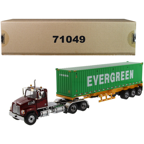 A Western Star 4700 SB Tandem Truck Tractor Metallic Red with Skeleton Trailer and 40' Dry Goods Sea Container "EverGreen" "Transport Series" 1/50 Diecast Model by Diecast Masters with a box next to it.