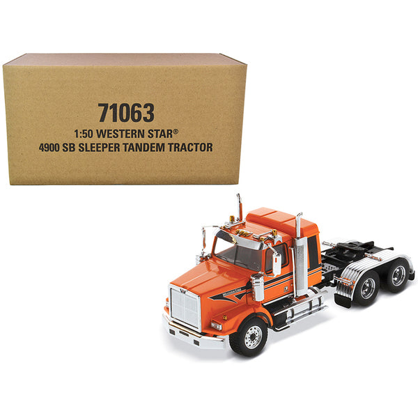 A box with a Western Star 4900 SB Tandem Sleeper Cab Truck Tractor Orange with Black Stripes "Transport Series" 1/50 Diecast Model by Diecast Masters in front of it.