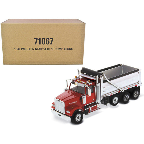 A Western Star 4900 SF Dump Truck Red and Silver 1/50 Diecast Model by Diecast Masters in front of a box.