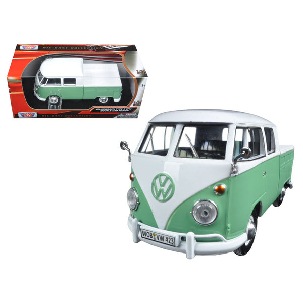 A white and green Volkswagen Type 2 (T1) Double Cab Pickup Truck in a box.