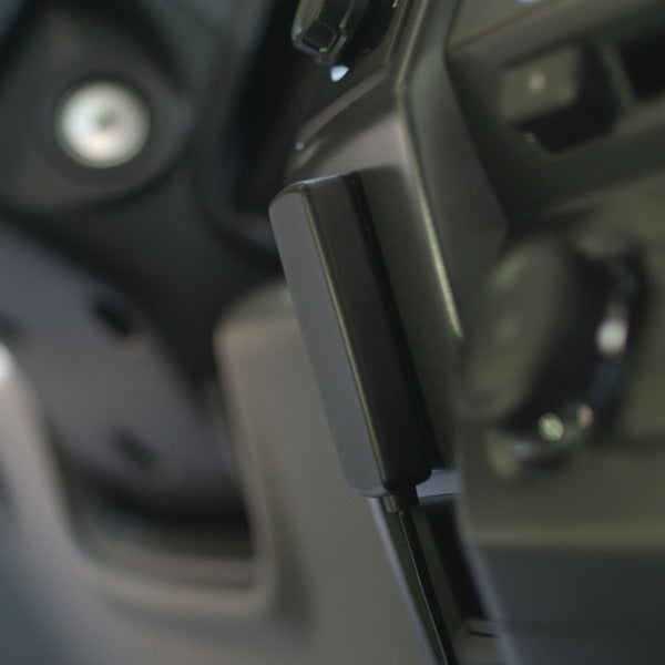 A black Wilson 4G Slim Low-Profile Antenna for Cars and Trucks on a white background.