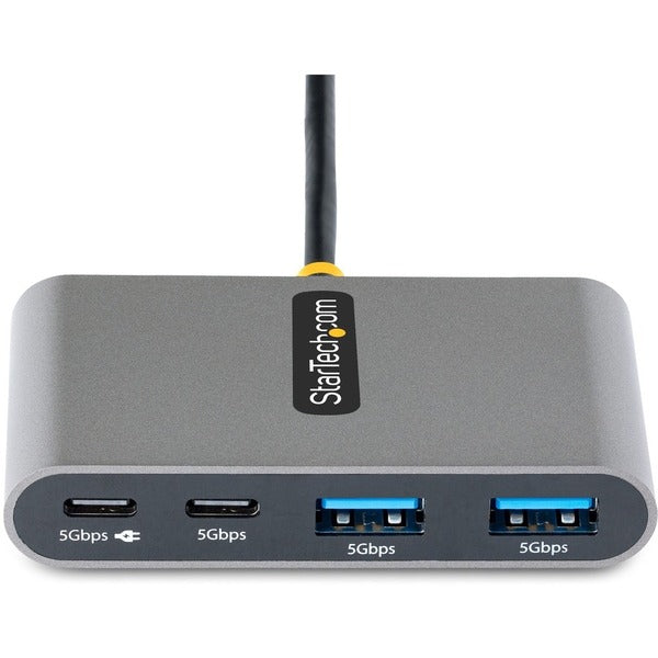 A StarTech.com 4-Port USB-C Hub with 100W Power Delivery Pass-Through, 2x USB-A + 2x USB-C, 5Gbps, 1ft/30cm Long Cable, Portable USB 3.0 Hub connected to a computer.
