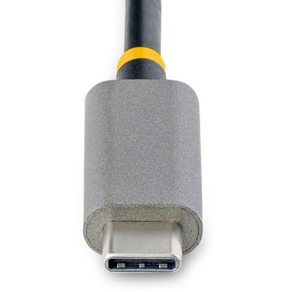 A StarTech.com 4-Port USB-C Hub with 100W Power Delivery Pass-Through, 2x USB-A + 2x USB-C, 5Gbps, 1ft/30cm Long Cable, Portable USB 3.0 Hub connected to a computer.