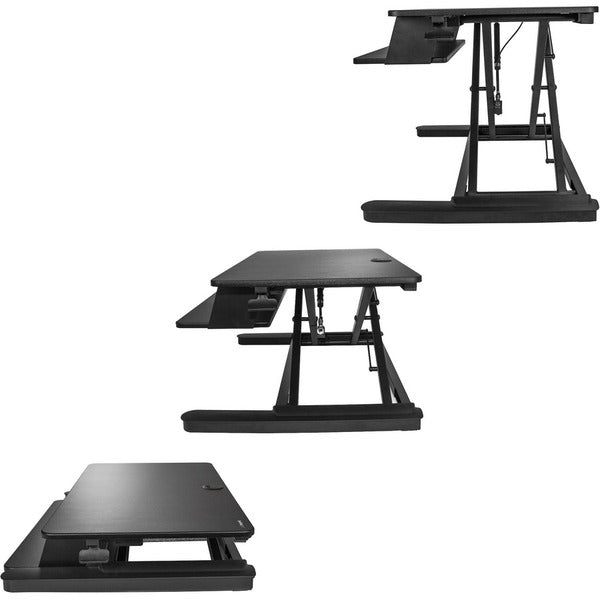 A StarTech.com Sit Stand Desk Converter - Keyboard Tray - Height Adjustable Ergonomic Desktop/Tabletop Standing Desk - Large 35"x21" Surface with a laptop on top.