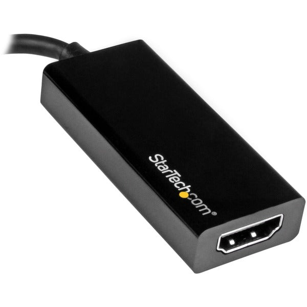 A black StarTech.com - USB-C to HDMI Adapter - 4K 30Hz - Black - USB Type-C to HDMI Adapter - USB 3.1 - Thunderbolt 3 Compatible.