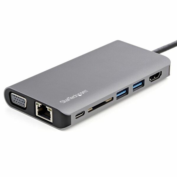 A StarTech.com USB C Multiport Adapter - USB-C Mini Travel Dock w/ 4K HDMI or 1080p VGA - 100W PD Pass-Through, 3x USB, SD, GbE, Audio connected to a computer.