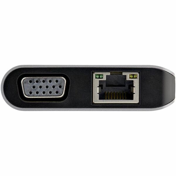 A StarTech.com USB C Multiport Adapter - USB-C Mini Travel Dock w/ 4K HDMI or 1080p VGA - 100W PD Pass-Through, 3x USB, SD, GbE, Audio connected to a computer.