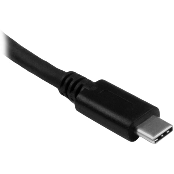 A Star Tech.com USB 3.0 Flash Memory Multi-Card Reader / Writer with USB-C - SD microSD and CompactFlash Card Reader w/ Integrated USB-C Cable connected to a computer.