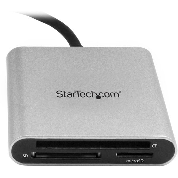 A Star Tech.com USB 3.0 Flash Memory Multi-Card Reader / Writer with USB-C - SD microSD and CompactFlash Card Reader w/ Integrated USB-C Cable connected to a computer.