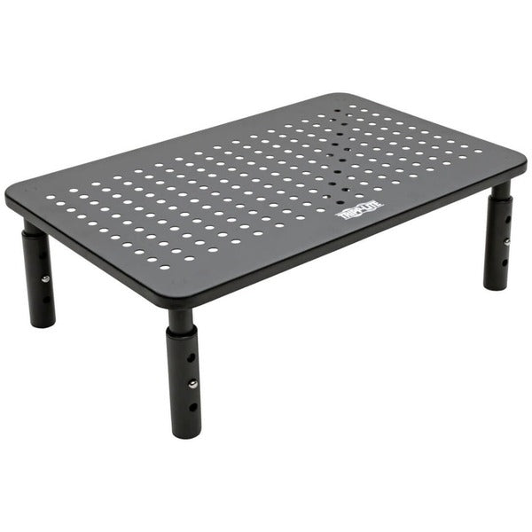 A Tripp Lite Monitor Riser Stand Desktop Metal Height Adjustable Black 14 x 9in with a set of tools on it.