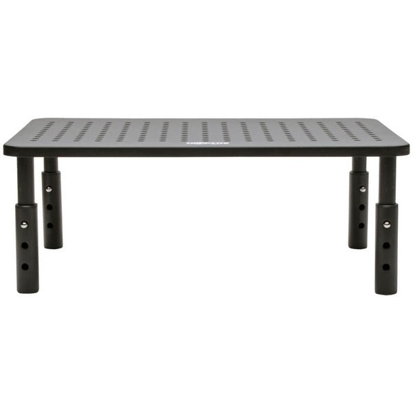 A Tripp Lite Monitor Riser Stand Desktop Metal Height Adjustable Black 14 x 9in with a set of tools on it.