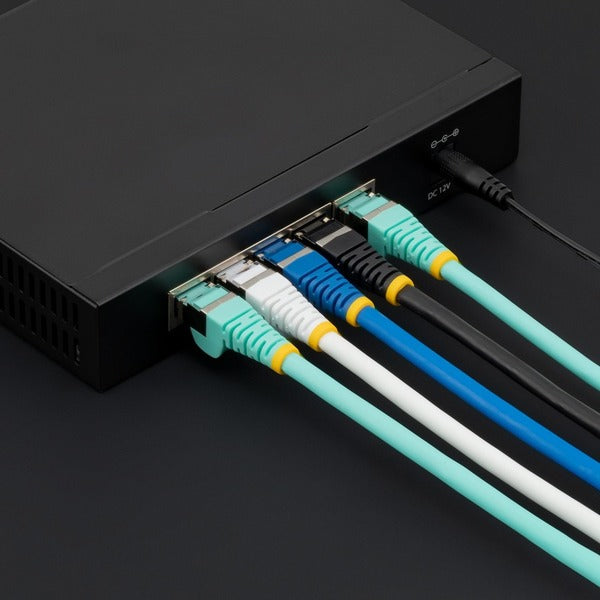 A pair of StarTech.com 3ft CAT6a Ethernet Cables, Blue Low Smoke Zero Halogen (LSZH) 10 GbE 100W PoE S/FTP Snagless RJ-45 Network Patch Cords on a white background.