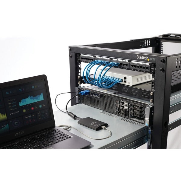 A StarTech.com USB Crash Cart Adapter with File Transfer &amp; Video Capture at 1920 x1200 60Hz with a usb cable.