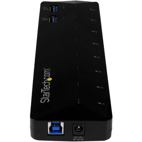 A black StarTech.com 10-Port USB 3.0 Hub with Charge and Sync Ports - 2 x 1.5A Ports - Desktop USB Hub and Fast-Charging Station with six usb ports.