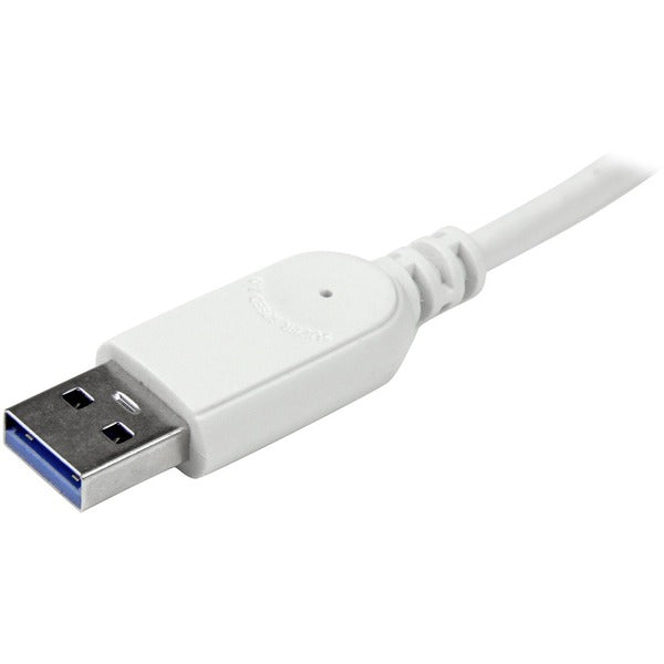 A StarTech.com 7 Port Compact USB 3.0 Hub with Built-in Cable - Aluminum USB Hub - Silver with four usb ports.