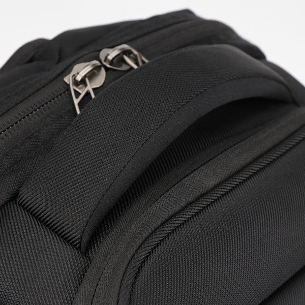 A Swissdigital Design SENSOR TSG4H198-1 Carrying Case (Backpack) for 15.6" to 16" Apple Notebook - Black with a zippered compartment.