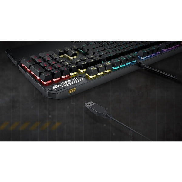 A TUF K3 Gaming Keyboard with colorful keys.