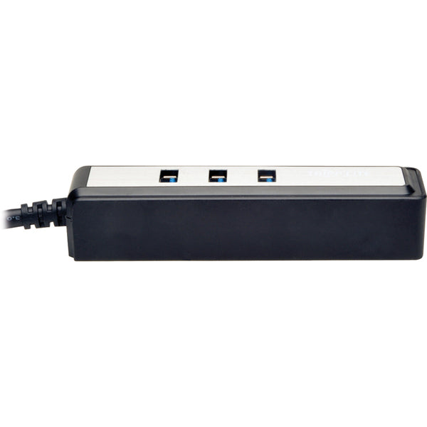 The Tripp Lite Portable 4-Port USB 3.0 Superspeed Mini Hub w/ Built In Cable is connected to a computer.