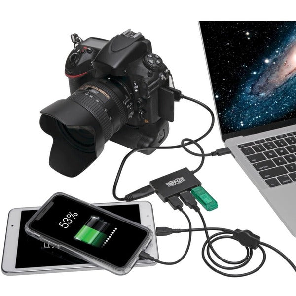 A black Tripp Lite USB C Hub 4-Port USB-A Compact USB 3.1 Gen 1 Portable Aluminum with two usb ports.