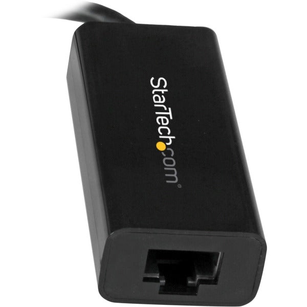 A black StarTech.com USB C to Gigabit Ethernet Adapter - Thunderbolt 3 - 10/100/1000Mbps adapter on a white background.