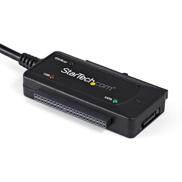 A StarTech.com USB 2.0 to SATA/IDE Combo Adapter for 2.5/3.5" SSD/HDD with a cable attached to it.