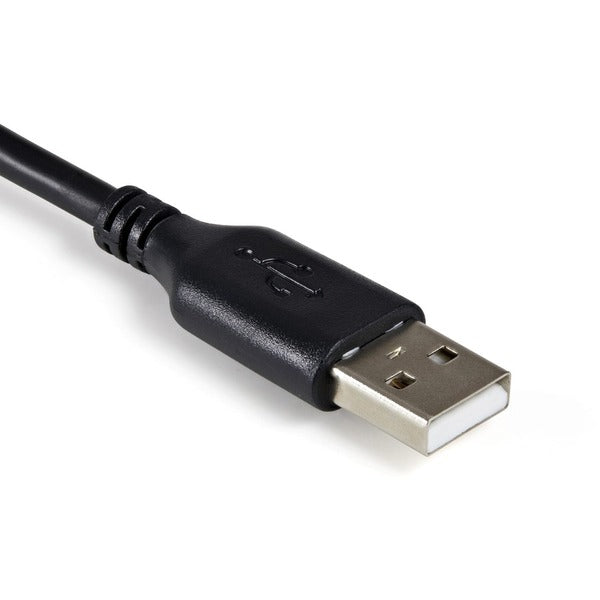A StarTech.com USB 2.0 to SATA/IDE Combo Adapter for 2.5/3.5" SSD/HDD with a cable attached to it.
