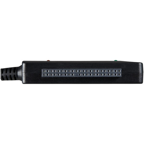 A StarTech.com USB 2.0 to SATA/IDE Combo Adapter for 2.5/3.5" SSD/HDD with a cable attached to it.