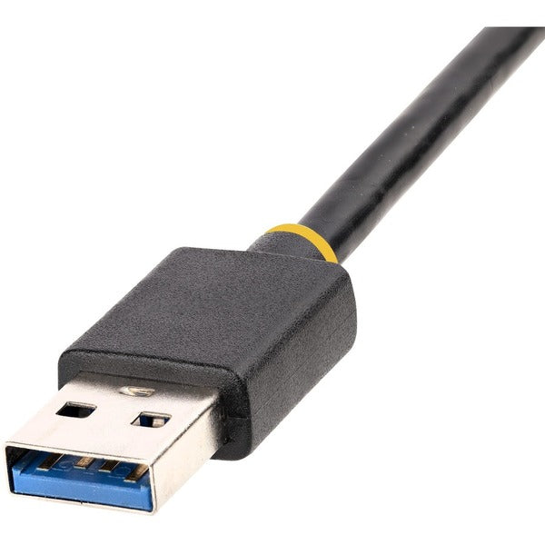 A StarTech.com USB to Ethernet Adapter, USB 3.0 to 10/100/1000 Gigabit Ethernet LAN Adapter with an 11.8in/30cm Attached Cable and a USB to RJ45 Adapter attached to it.