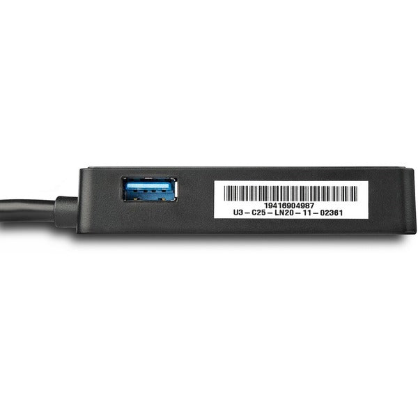 A StarTech.com USB 3.0 to Gigabit Ethernet Adapter NIC w/ USB Port - Black connected to a computer.