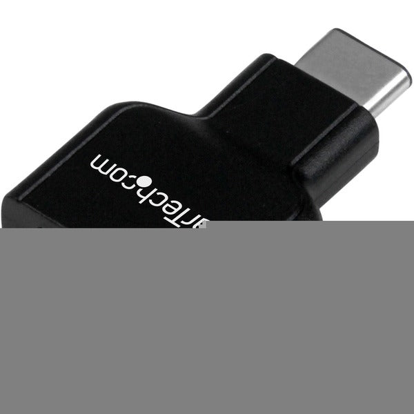 A black StarTech.com USB-C to USB Adapter - USB-C to USB-A - USB 3.1 Gen 1 - 5Gbps - USB C Adapter - USB Type C on a white background.