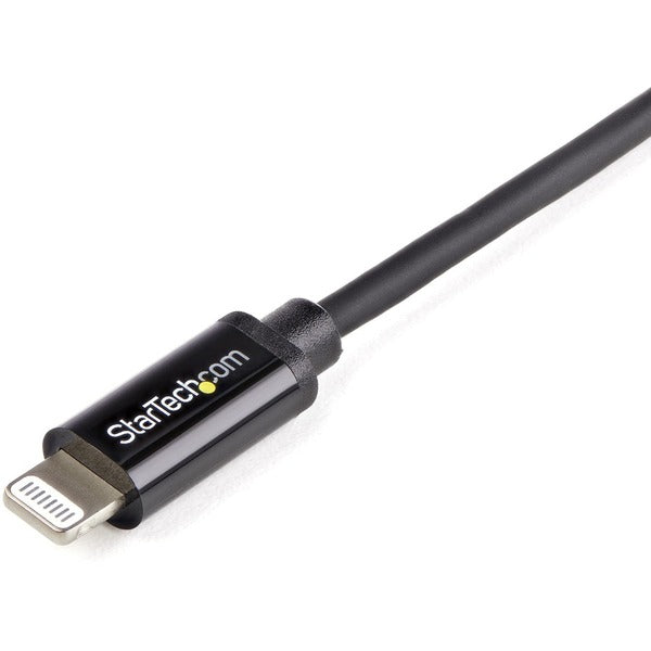 A black StarTech.com 1m (3ft) Black Apple 8-pin Lightning Connector to USB Cable connected to an iphone.