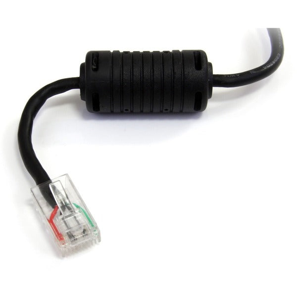 A black StarTech.com 6 ft Smart UPS Replacement USB Cable AP9827 connected to a computer with an RJ-45 male connector.