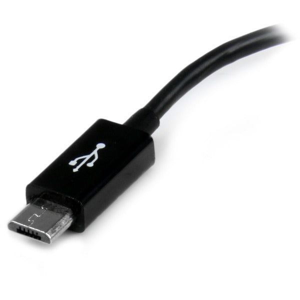 A black StarTech.com 5in Micro USB to USB OTG Host Adapter M/F.