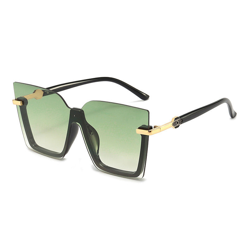 The Sunglasses Ocean Slices Multicolor Personality Trend Sunglasses for Men and Women feature a black oversized square design with gradient lenses, highlighted by thin gold accents on the temples and a small decorative logo near the hinges. These polarized sunglasses offer UV400 protection, making them both stylish and practical for fashion wear.