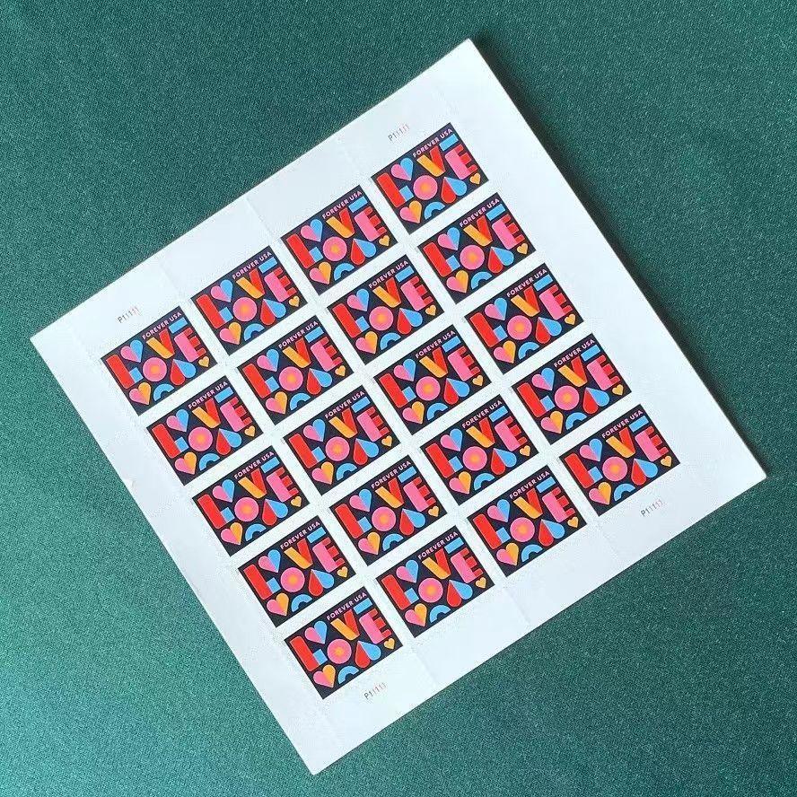 A sheet of Love Wedding 2021 - 5 Sheets / 100 Pcs themed postage stamps on a teal background, accompanied by its envelope from the United States Postal Service.