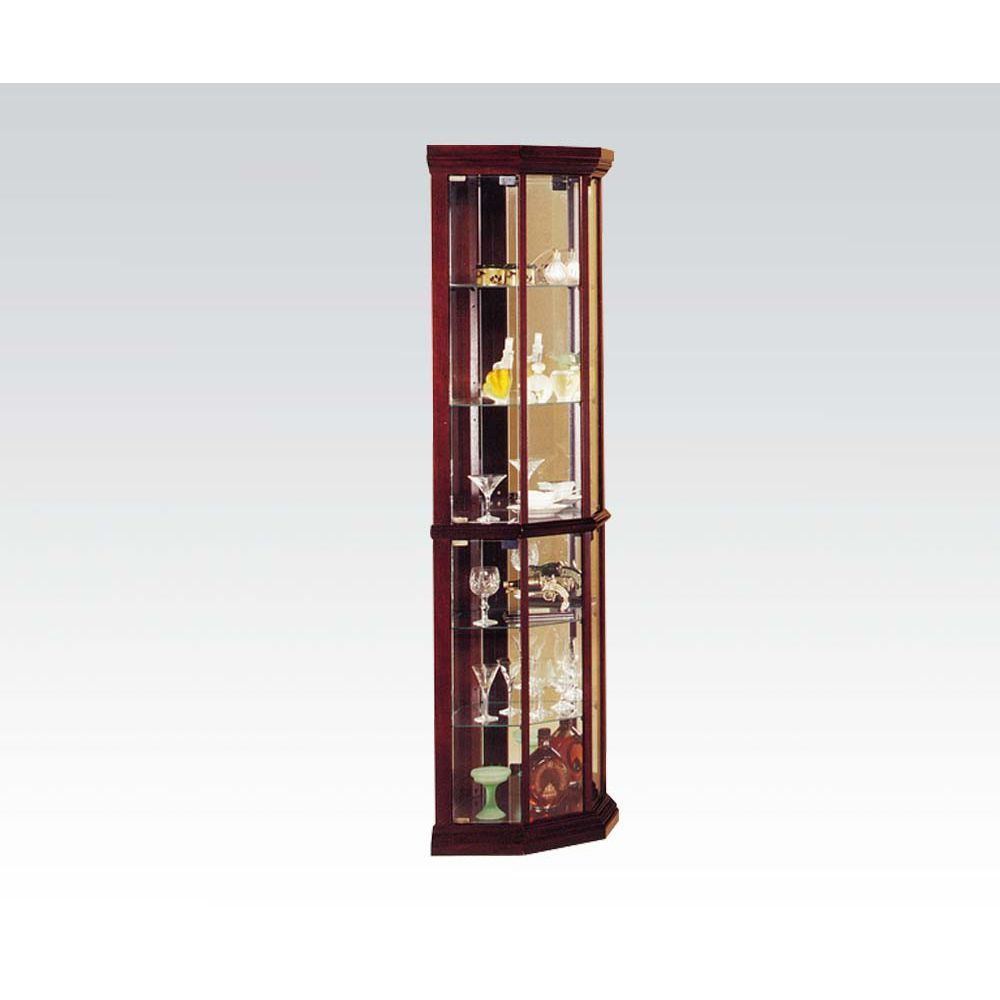 A Huxley Curio Cabinet in Cherry with glass shelves and doors.