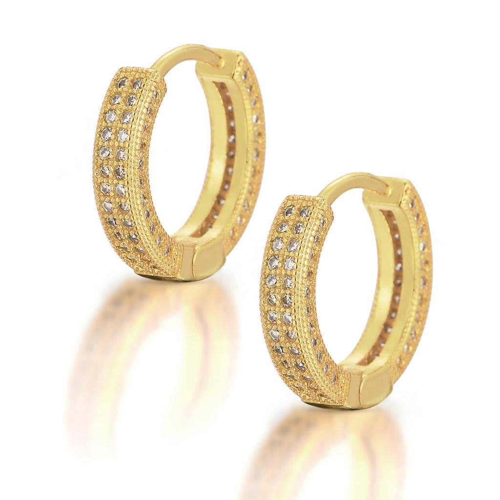 Close-up of a woman's ear wearing a Hoop Earrings Micro Encrusted Zircon Stud Earrings Bling Hip Hop Earrings For Men And Women.